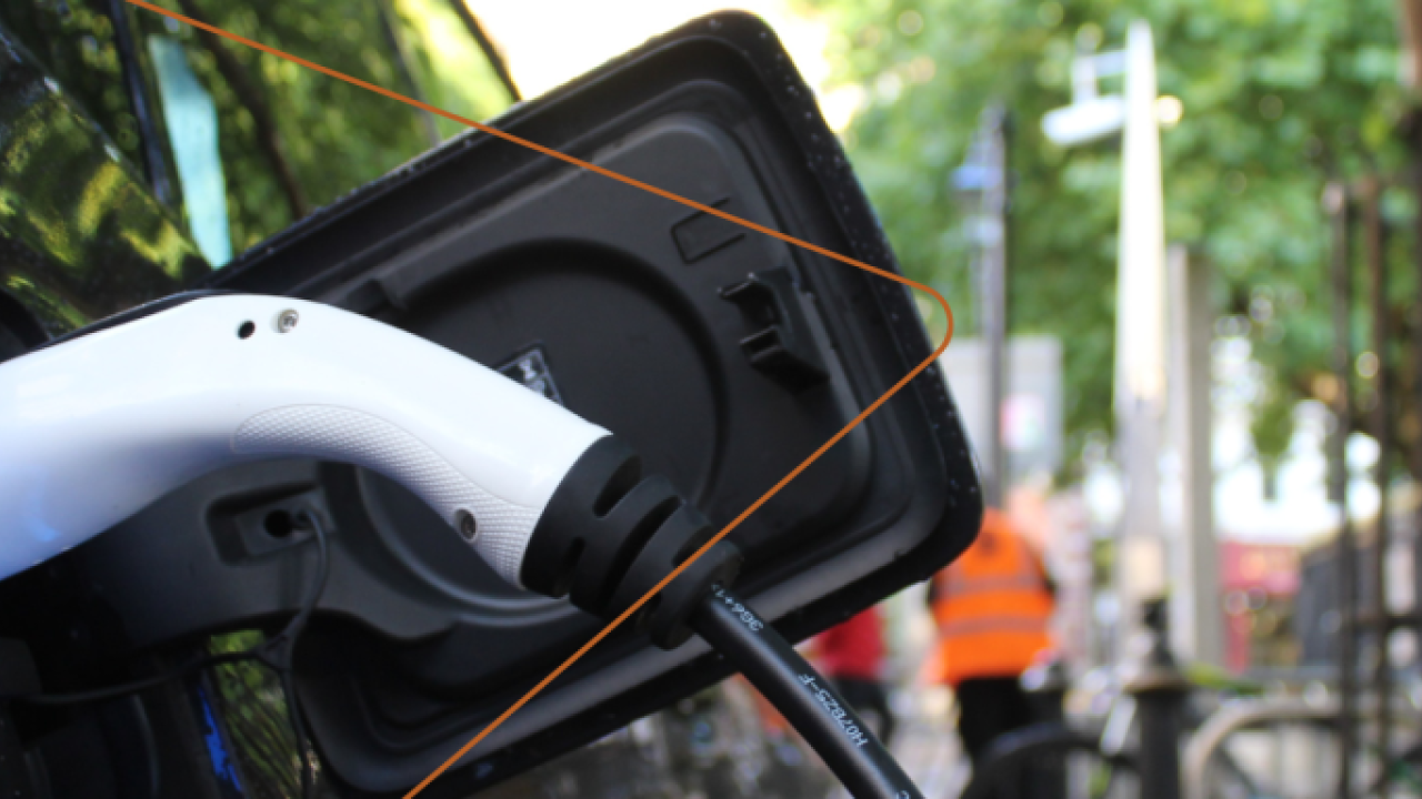 close up of a plugged in electric vehicle