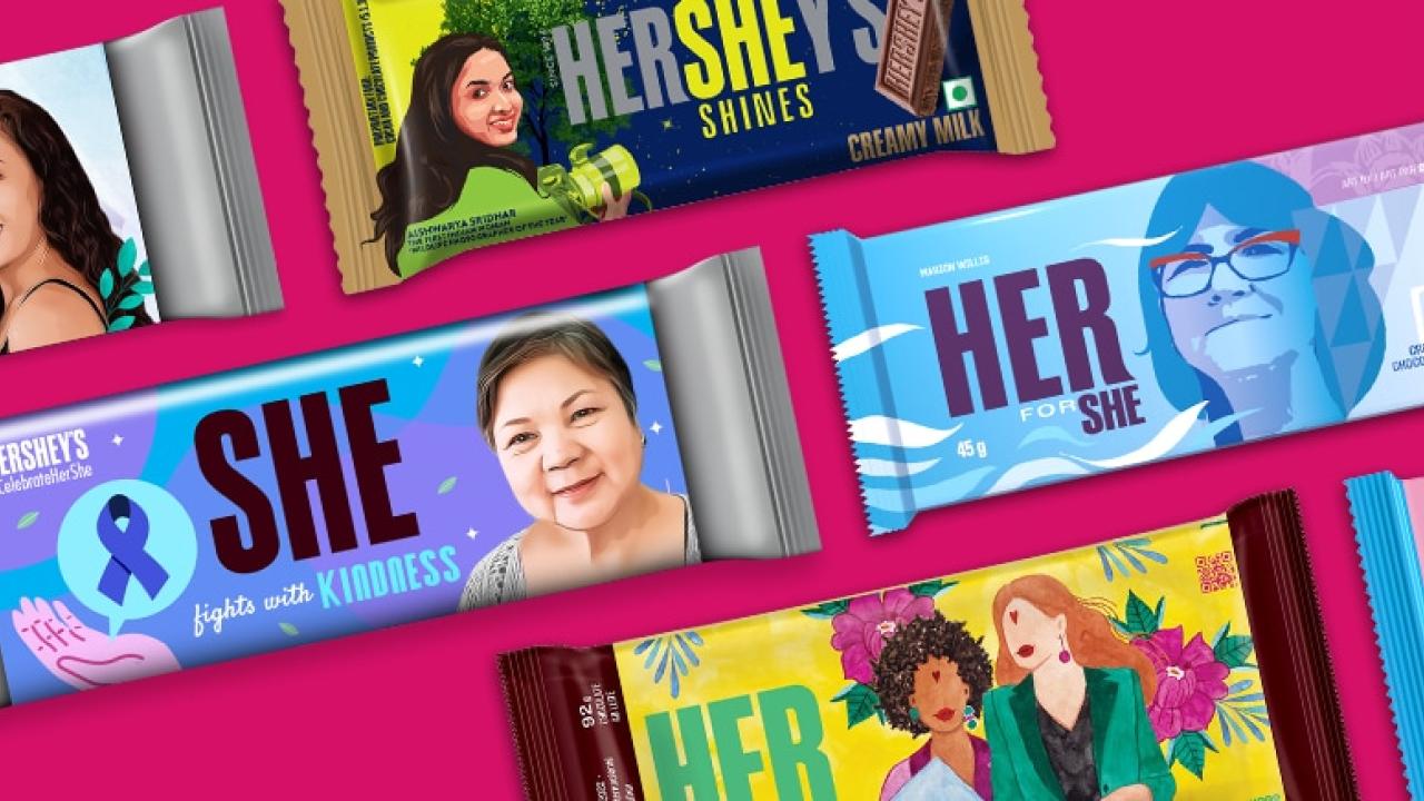Hershey Bars with new wrappers highlighting "HER" and "SHE" 