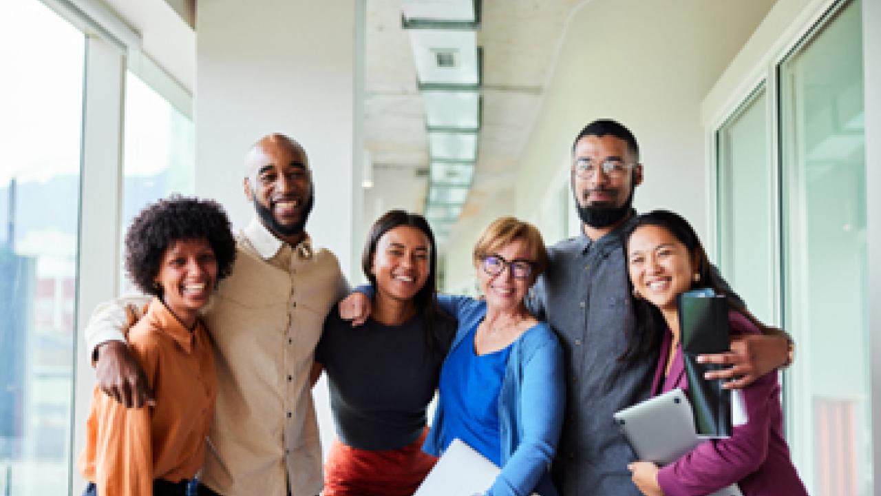 group of employees smiling