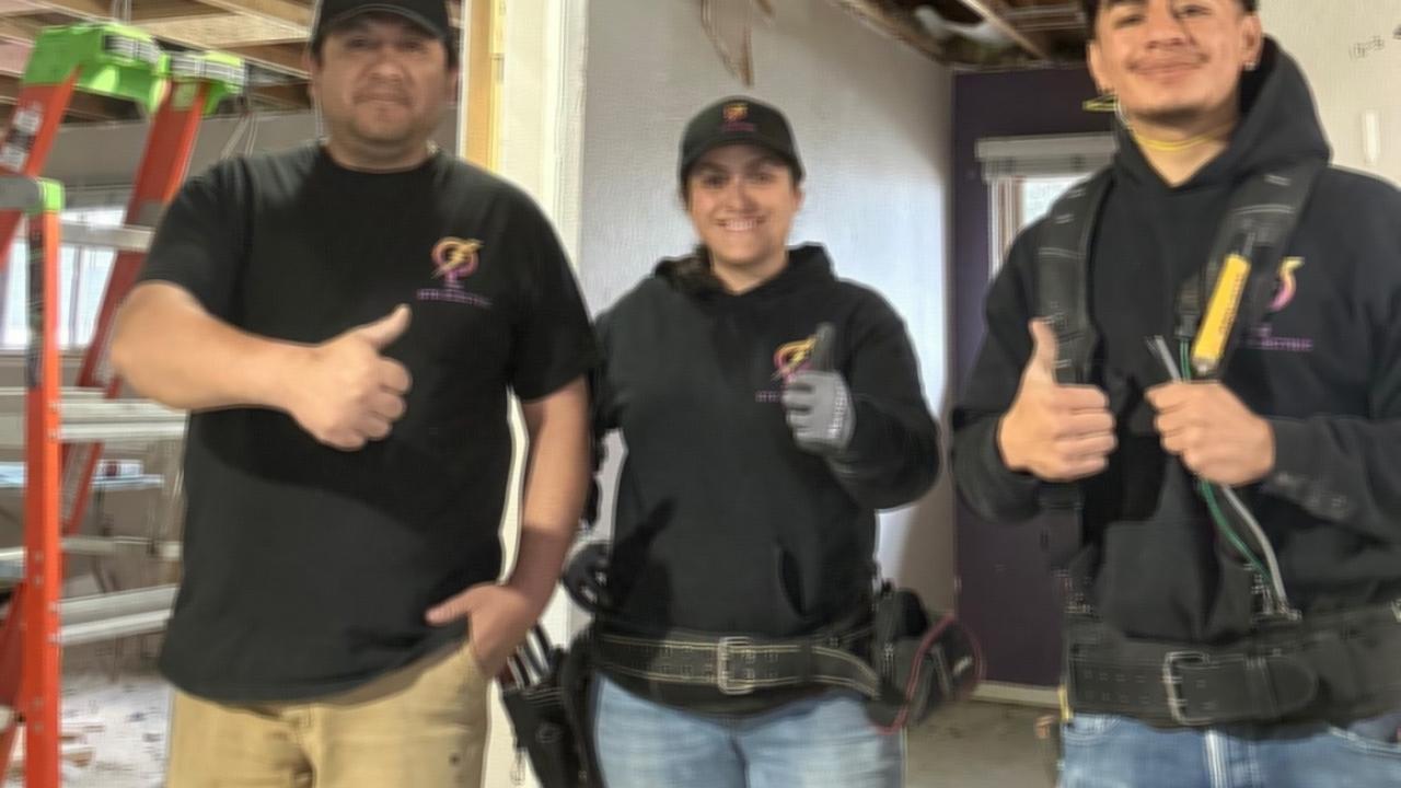 IEC Foundation: electrical workers shown with thumbs up.