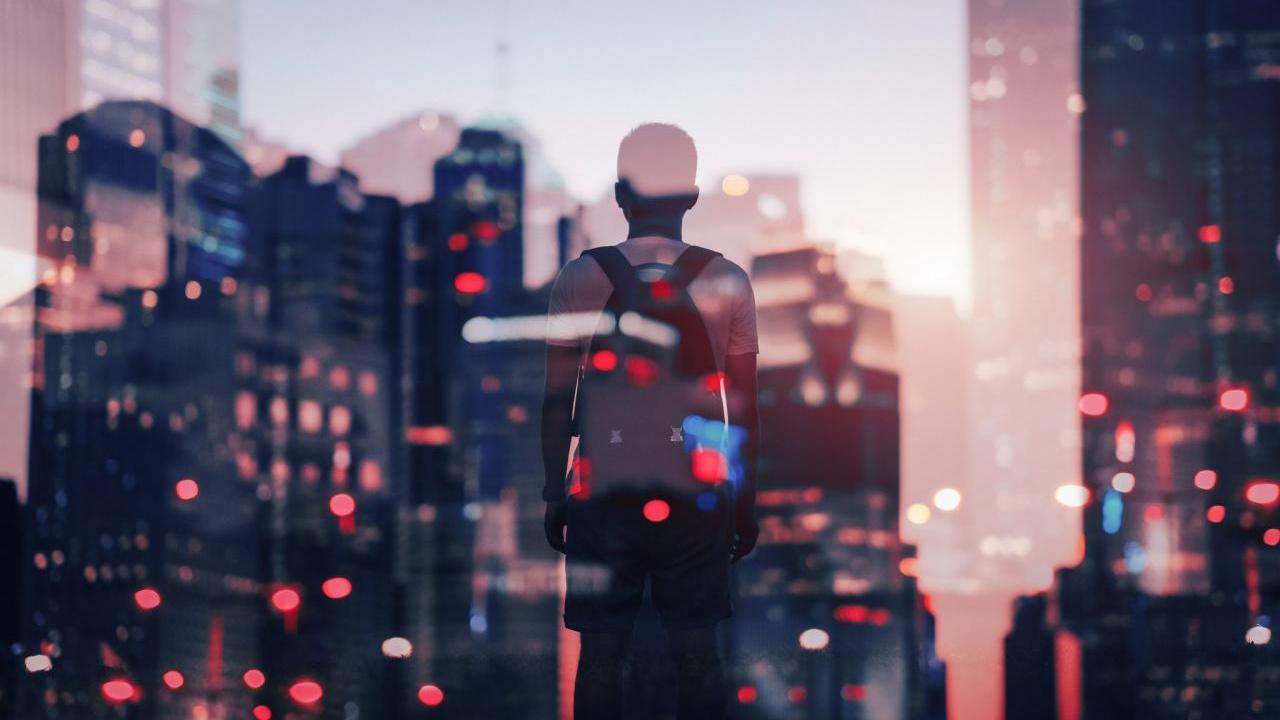 composite image of a child and several city skylines
