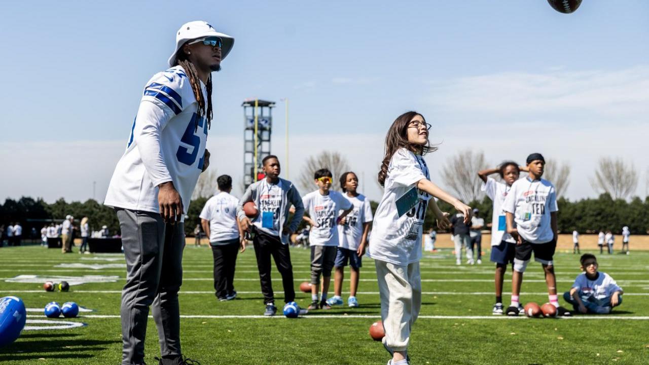 Kids playing football on Field Day