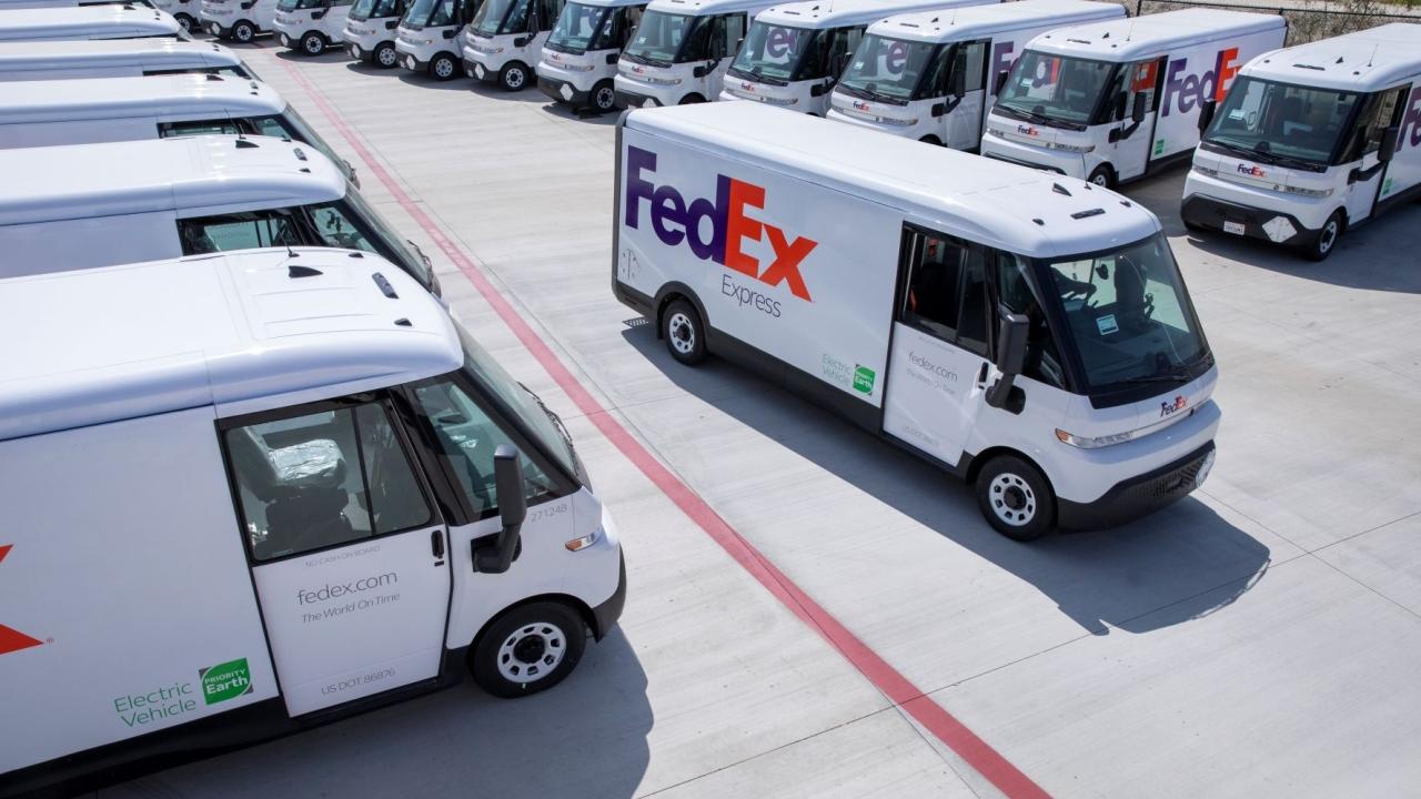 FedEx electric vehicles in parking lot