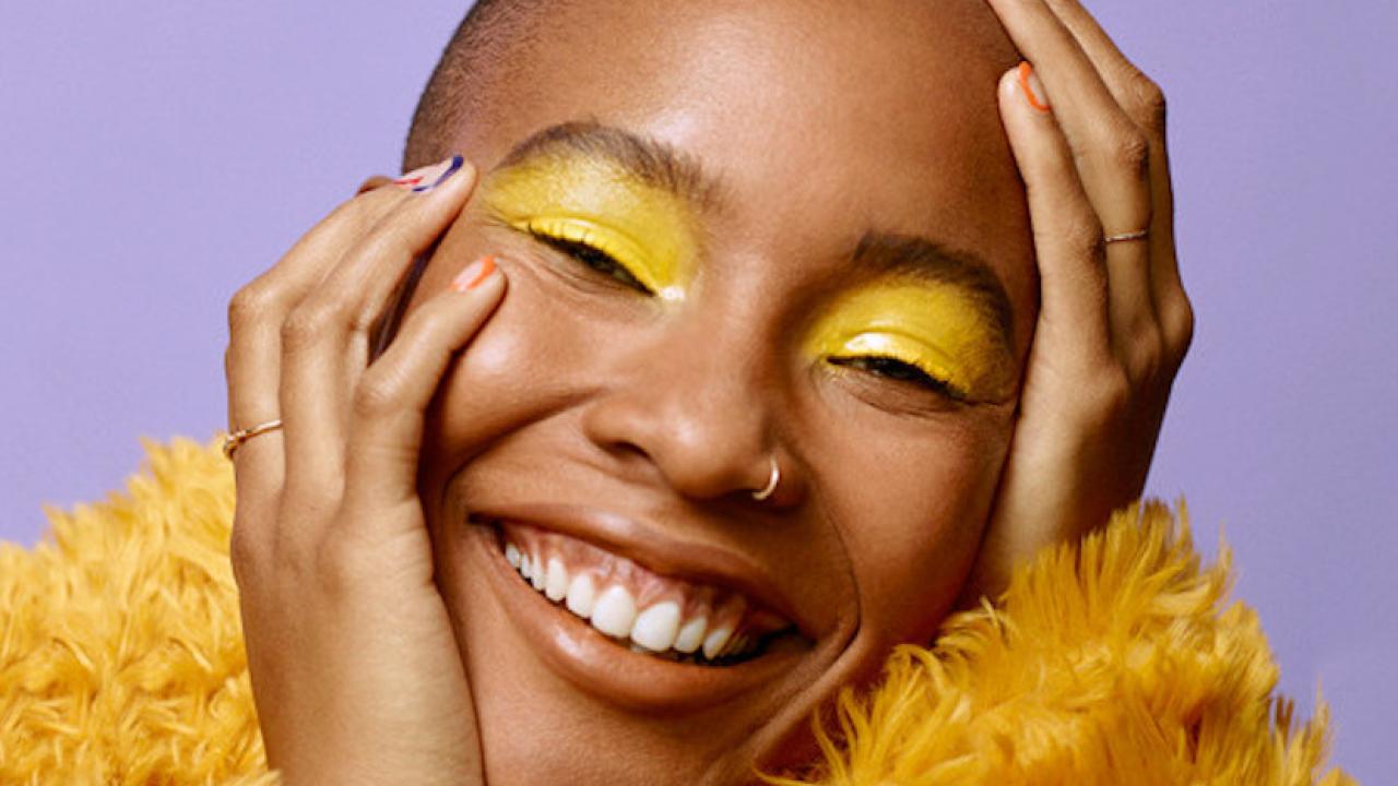 headshot of person wearing makeup