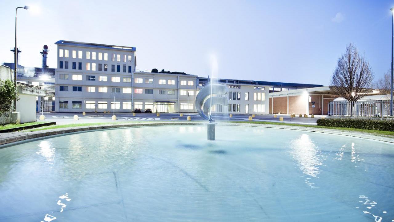 building with water feature in front