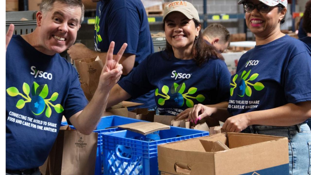 people standing with food crates