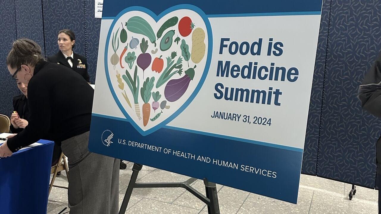 A board on display "Food is Medicine Summit"