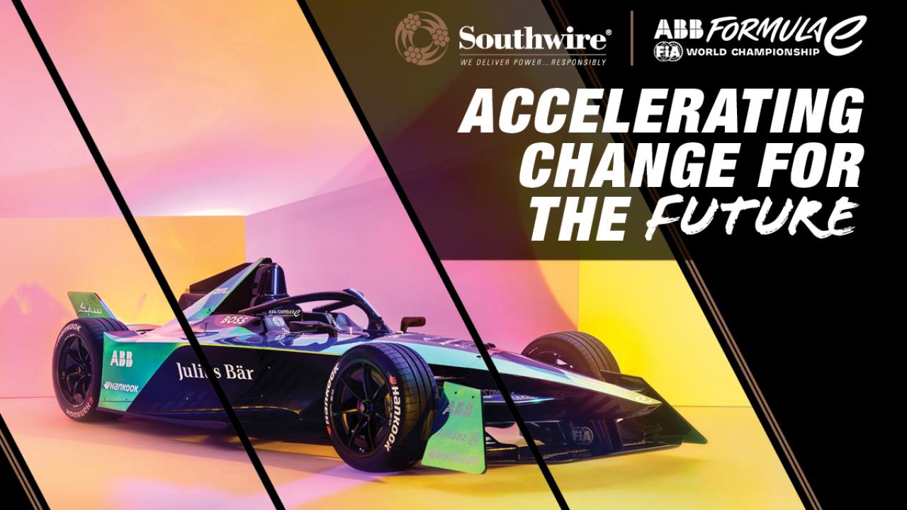 "Accelerating change for the future" Formula 1 type race car with pink and yellow lighting. Southwire logo and ABB formula E logo.