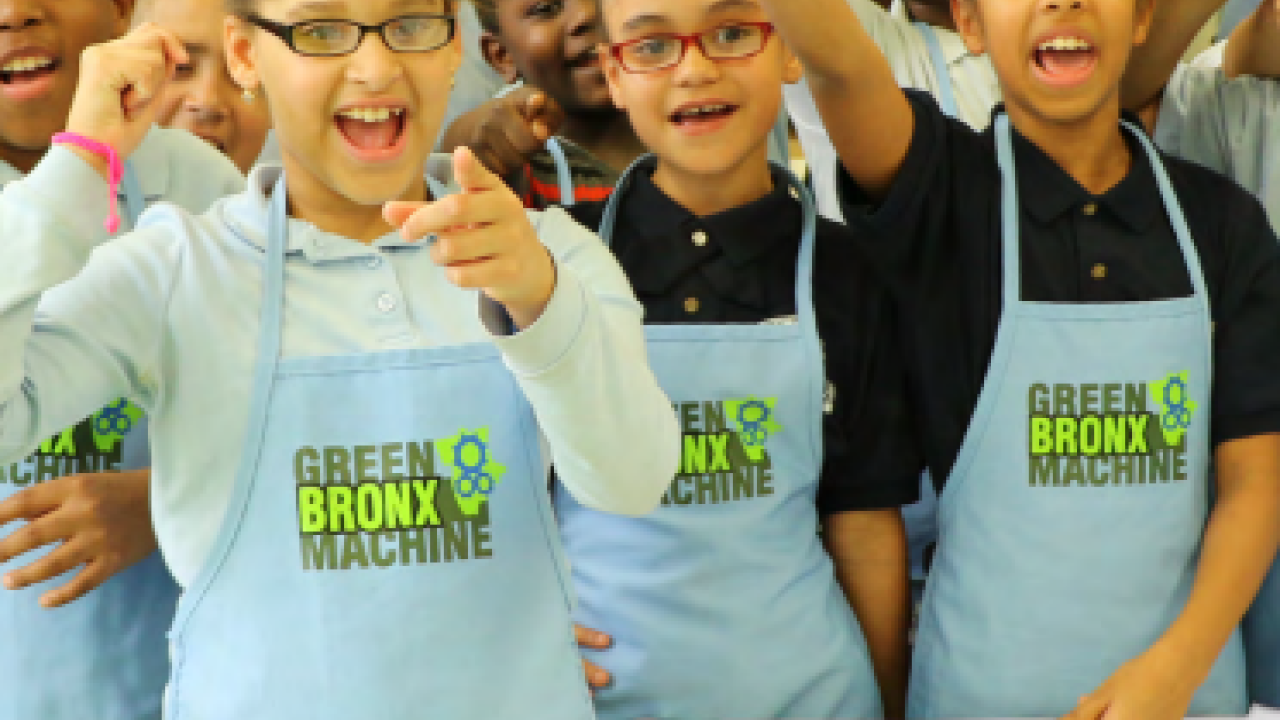 Kids in aprons that read, "Green Bronx Machine"