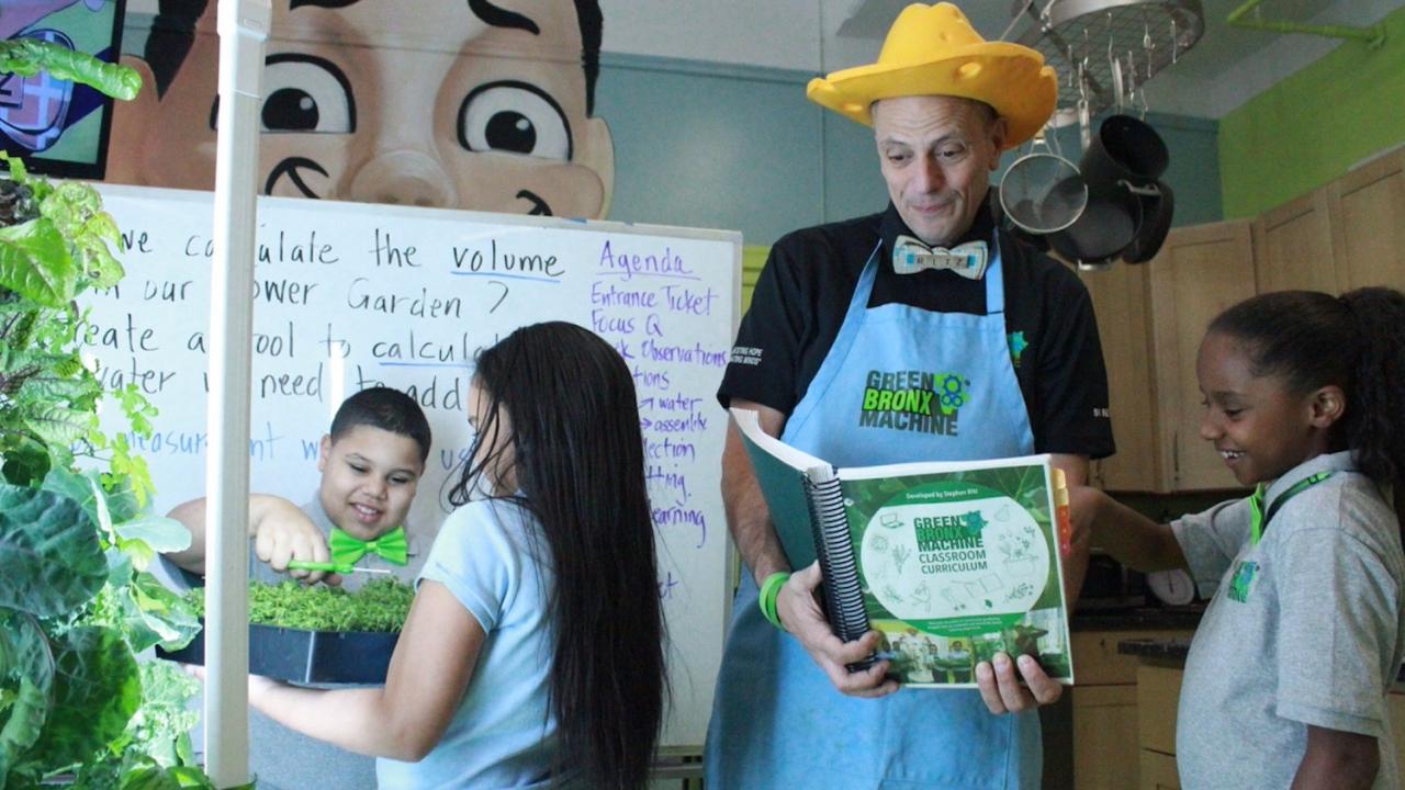 Teacher reading to students in classroom