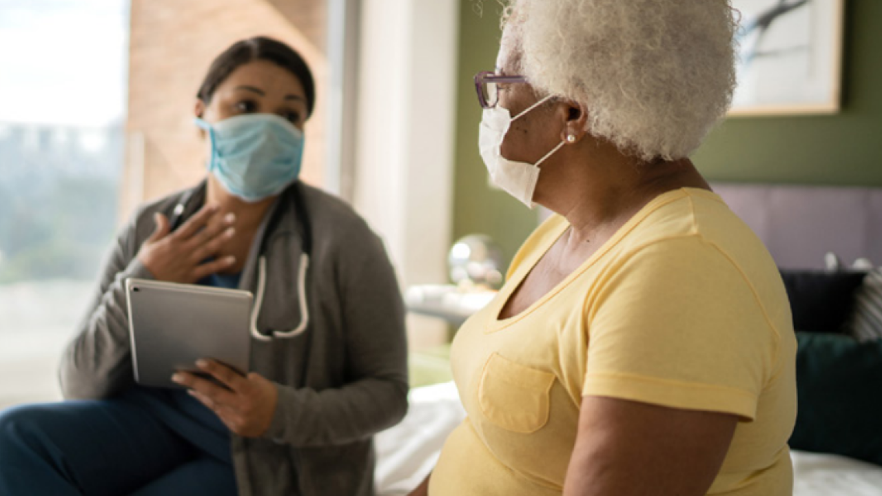 Patient talking to a nurse or doctor