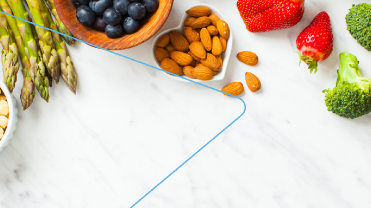 Healthy foods on a marble countertop.