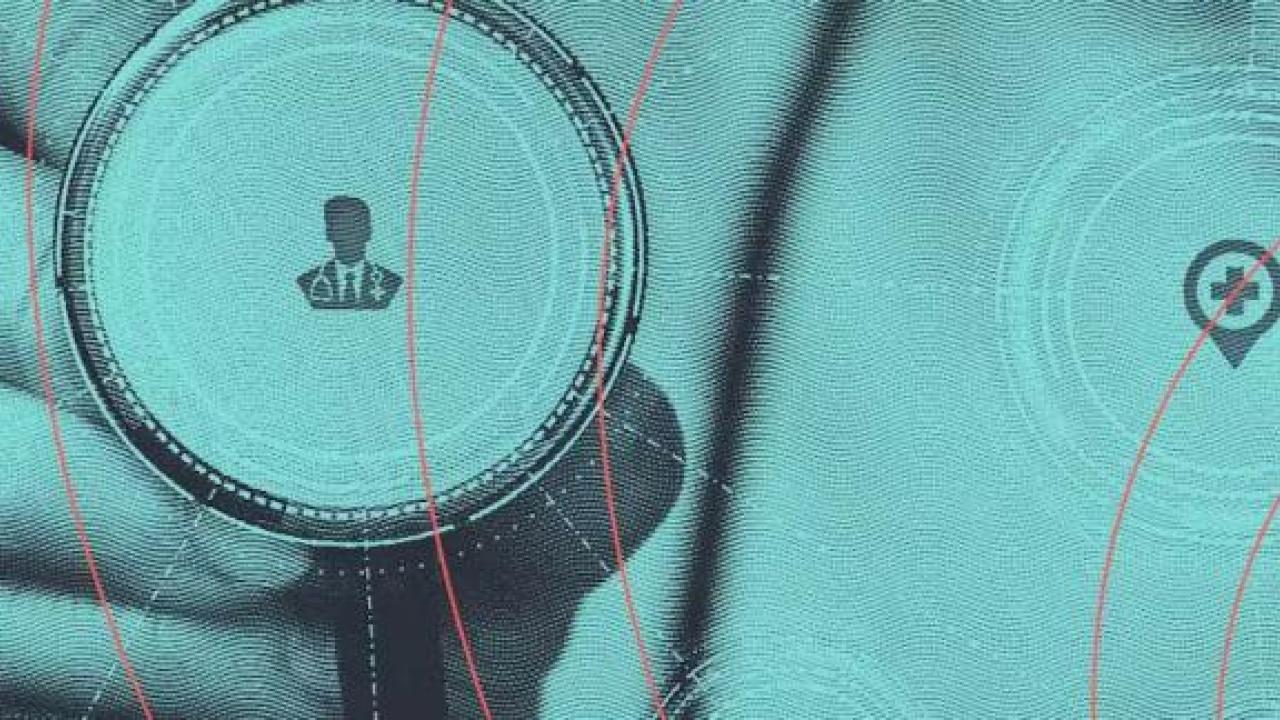A stethoscope held up. A green tint over the image. 