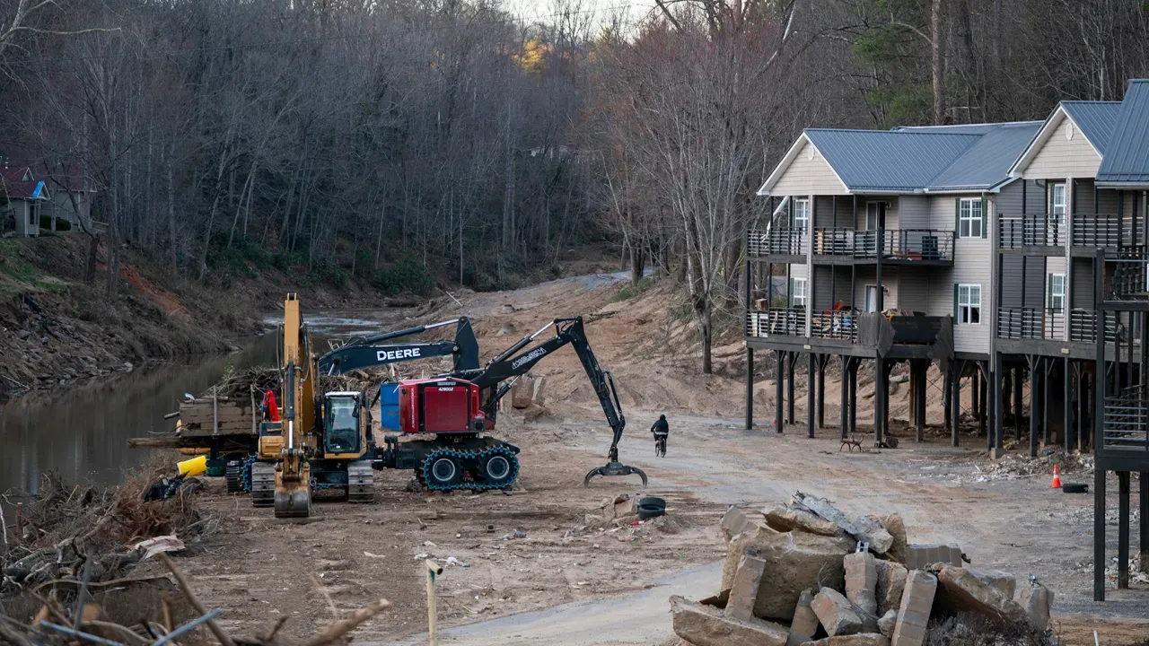 A storm damaged apartment complex in a landscape scarred by Hurricane Helene on March 24, 2025, near Swannanoa, North Carolina. More than six months after the historic storm, communities in western North Carolina continue the recovery process. (Photo by Sean Rayford/Getty Images)