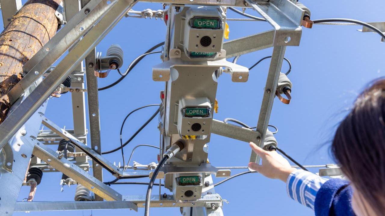 people working on a utility