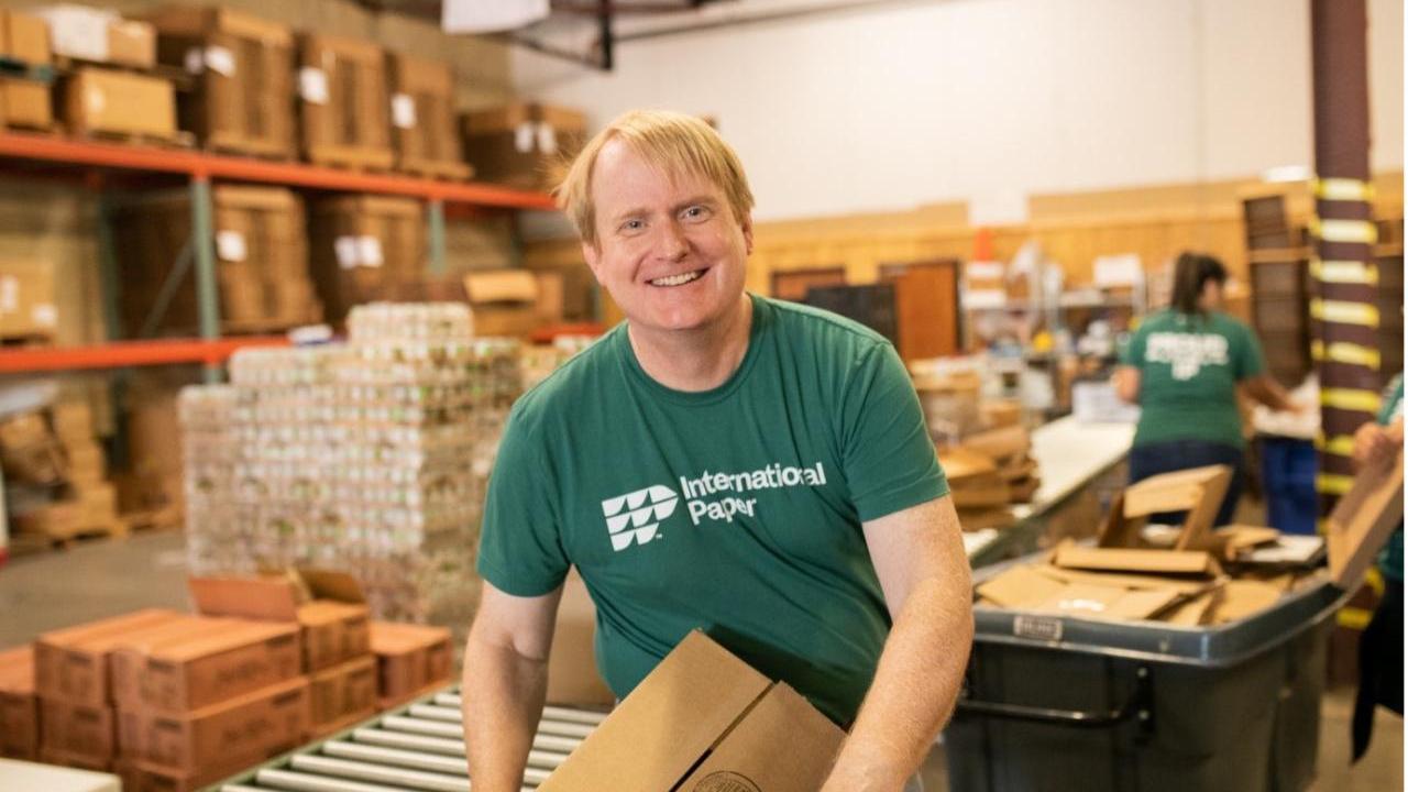 person helping out with boxes