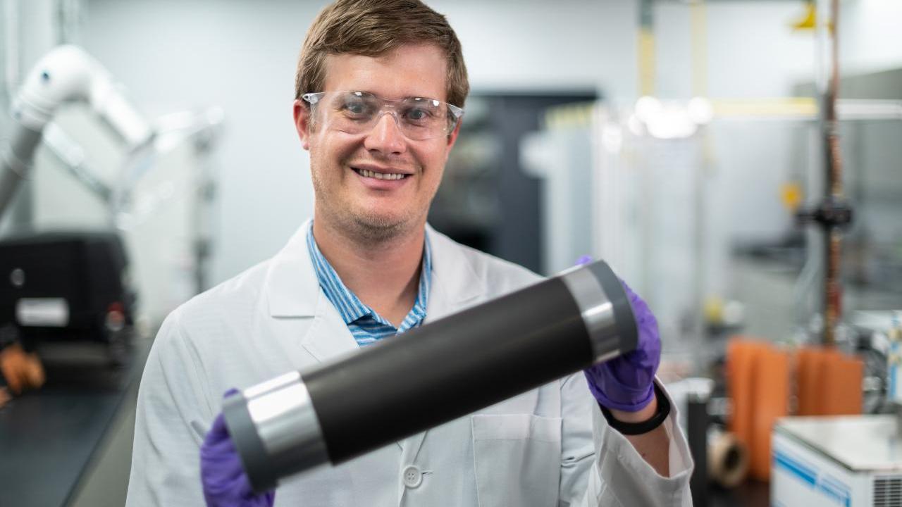 scientist with device with conductive coatings