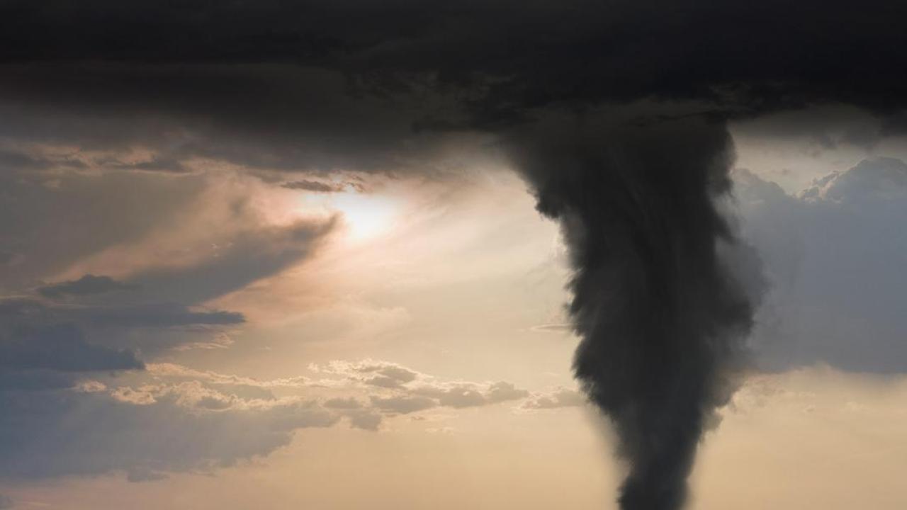 Photo of a tornado in the sky 