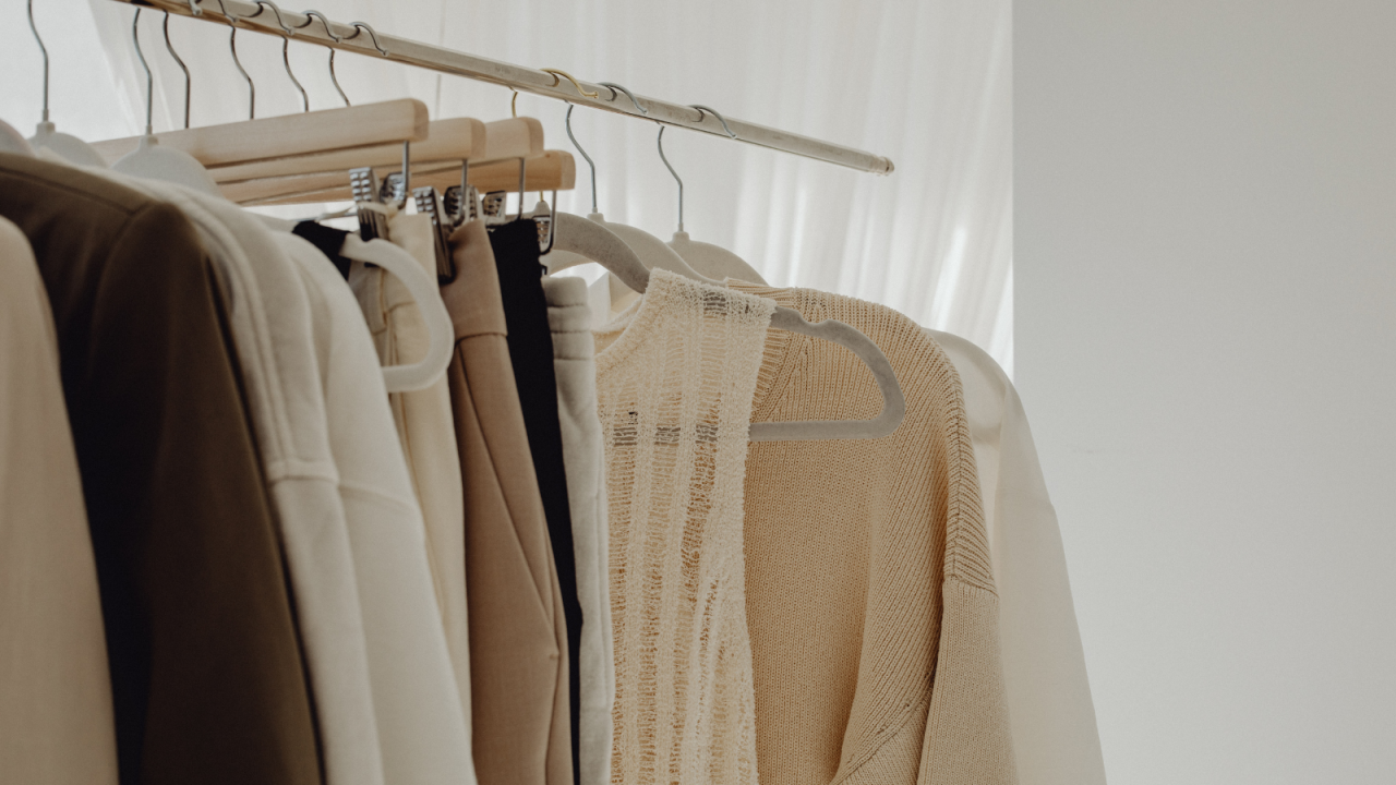 Clothes hanging up in closet