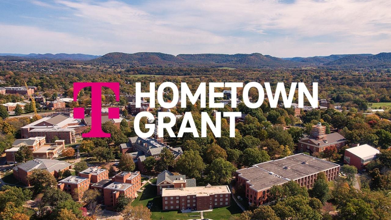 Aerial view of a town "Hometown Grant" and TMobile logo on top.