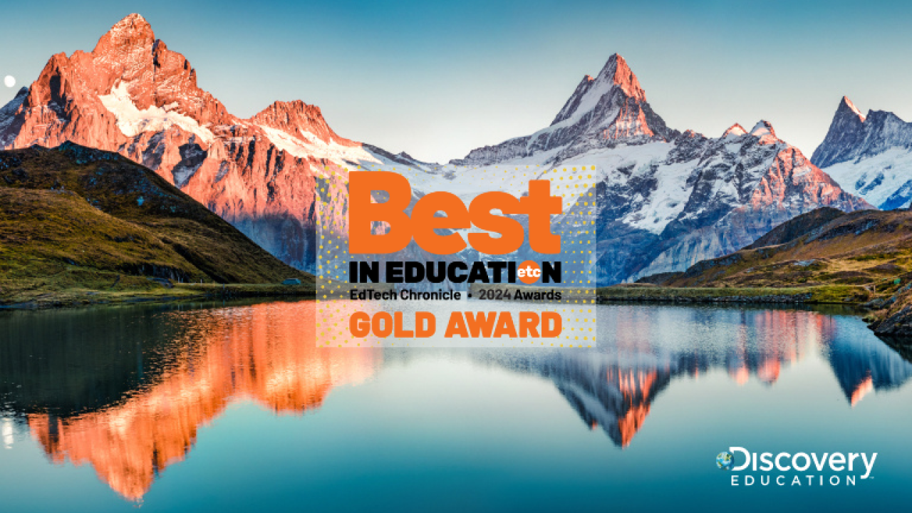 Sunlit mountains and water overlaid with text: Best in Education EdTech Chronicle 2024 Awards GOLD AWARD