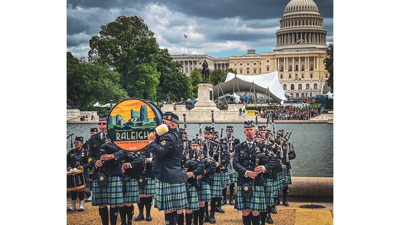 group of people playing bag pipes