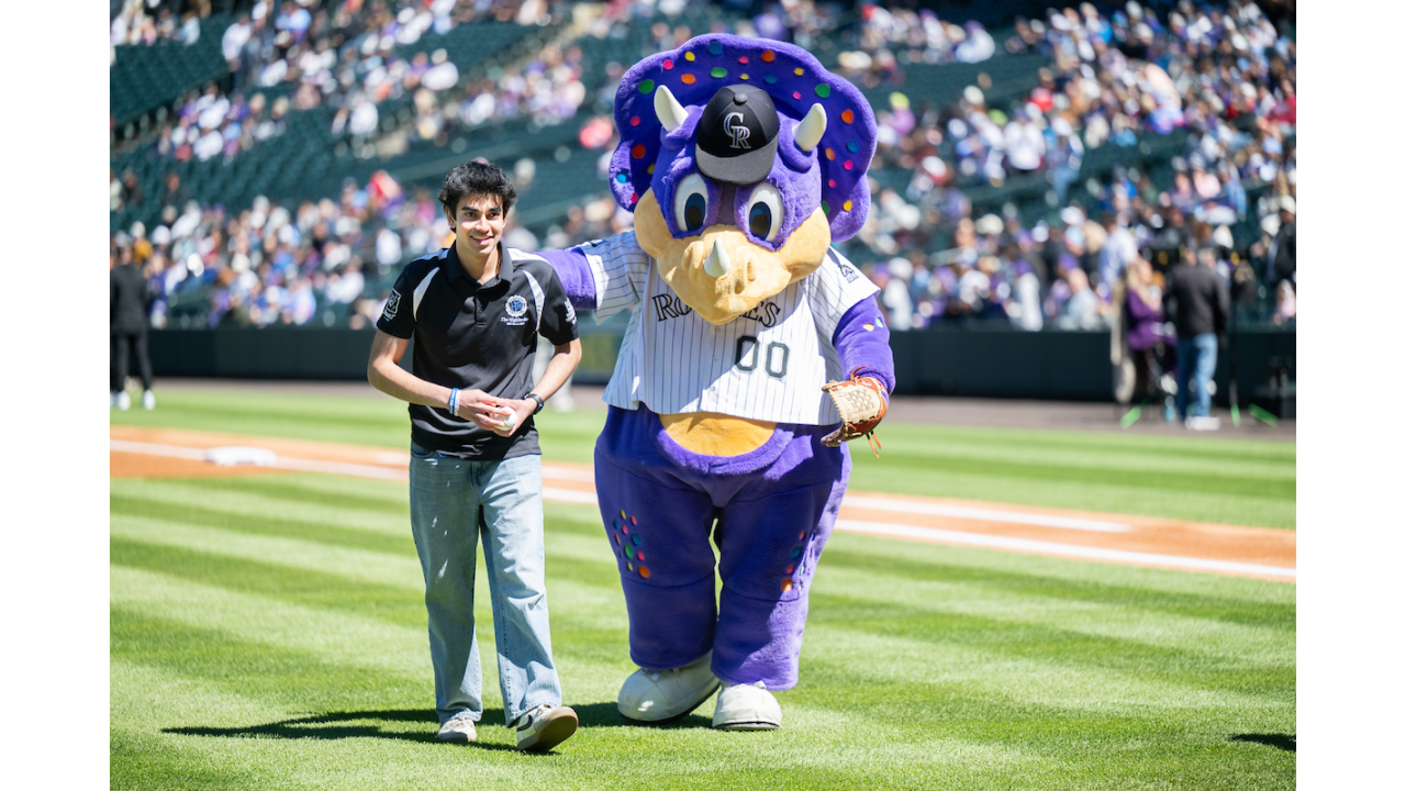 person walking with mascot