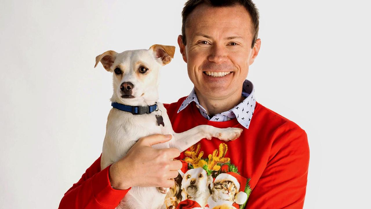 Daniel Grosu holding his puppy Nala