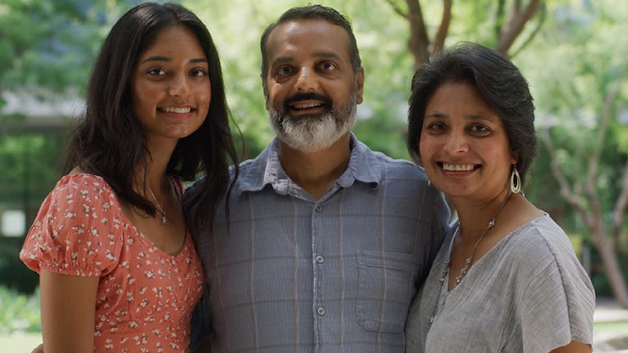 Photo of AJ Patel, his wife and daughter.