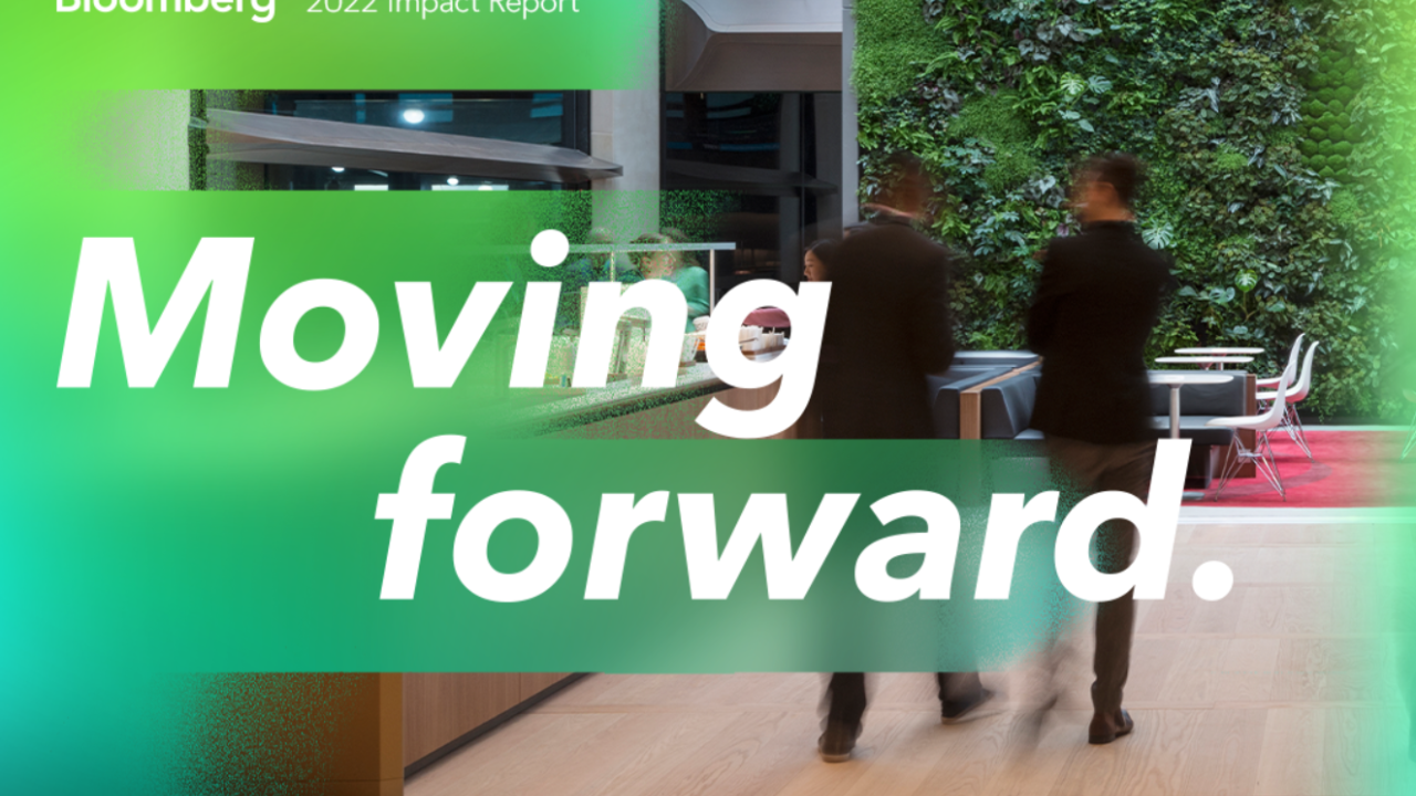"Bloomberg 2022 Impact Report Moving forward" Two people blurred, walking together.