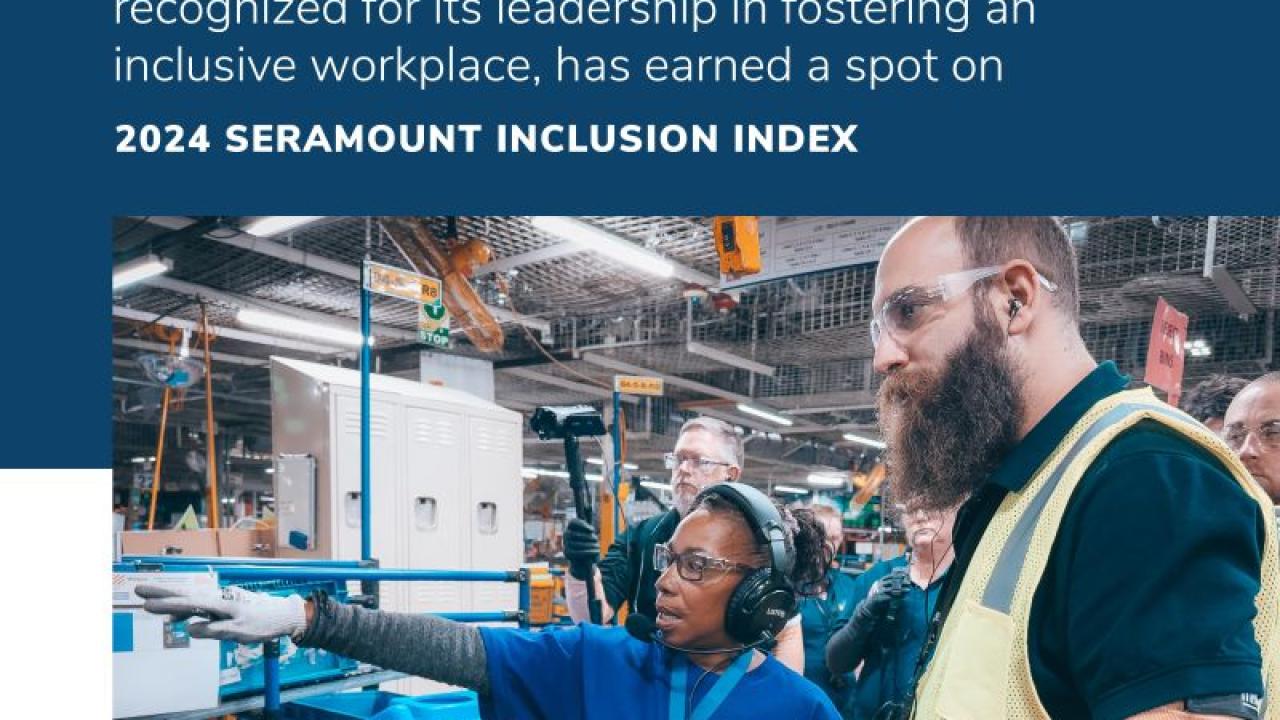 People gathered, wearing safety gear, one pointing to the distance and others looking there. "Whirlpool corporation, recognized for its leadership in fostering an inclusive workplace, has earned a spot on 2024 Seramount Inclusion Index".