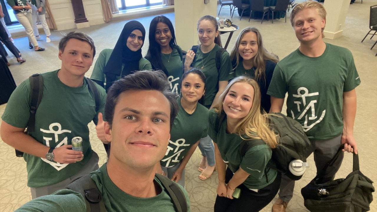 interns smiling together