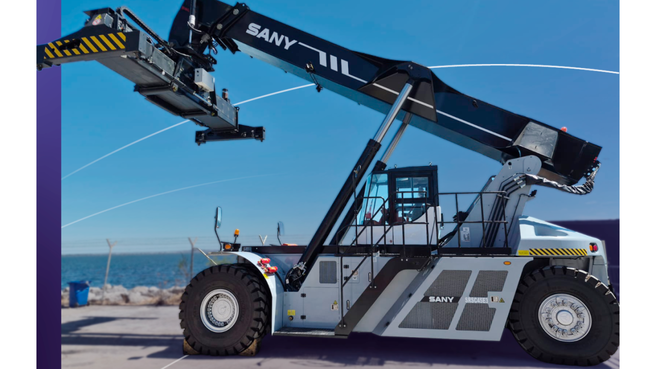 Side view of a fully electric SANY SRSC45E3 Reach Stacker at DP World’s Lirquén port terminal with ocean in background.