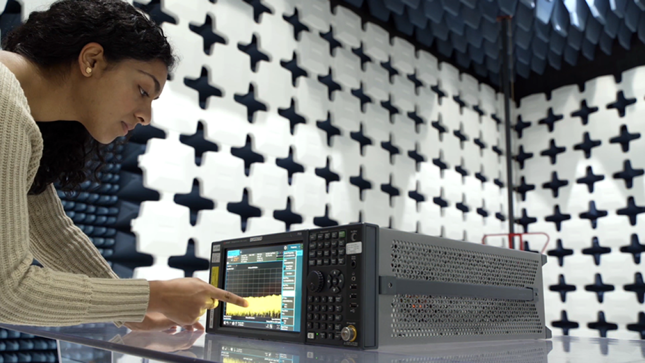 woman working on a testing machine