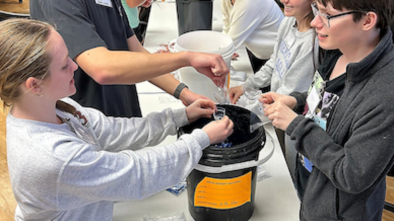 Students shown recycling.