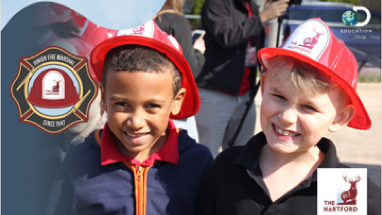 two children with red hats on