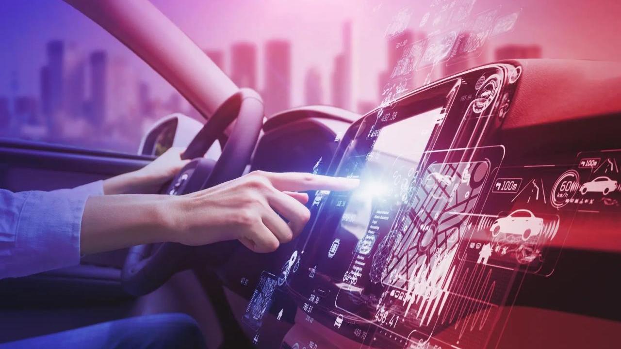 person using a console while driving