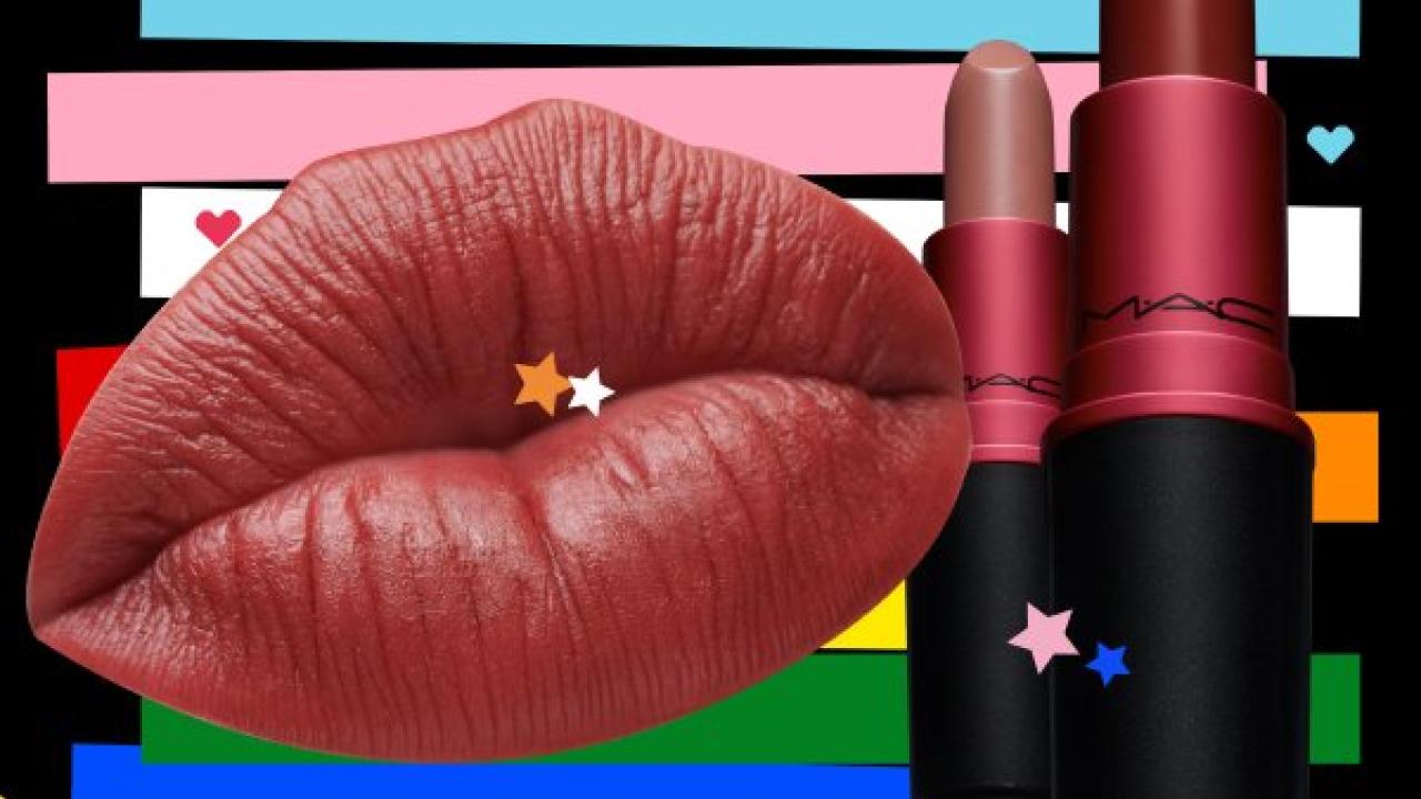 Lips and two lipsticks on top of different colored stripes.