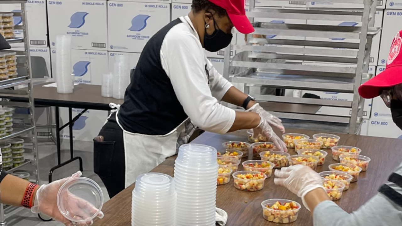 Volunteers prepping food