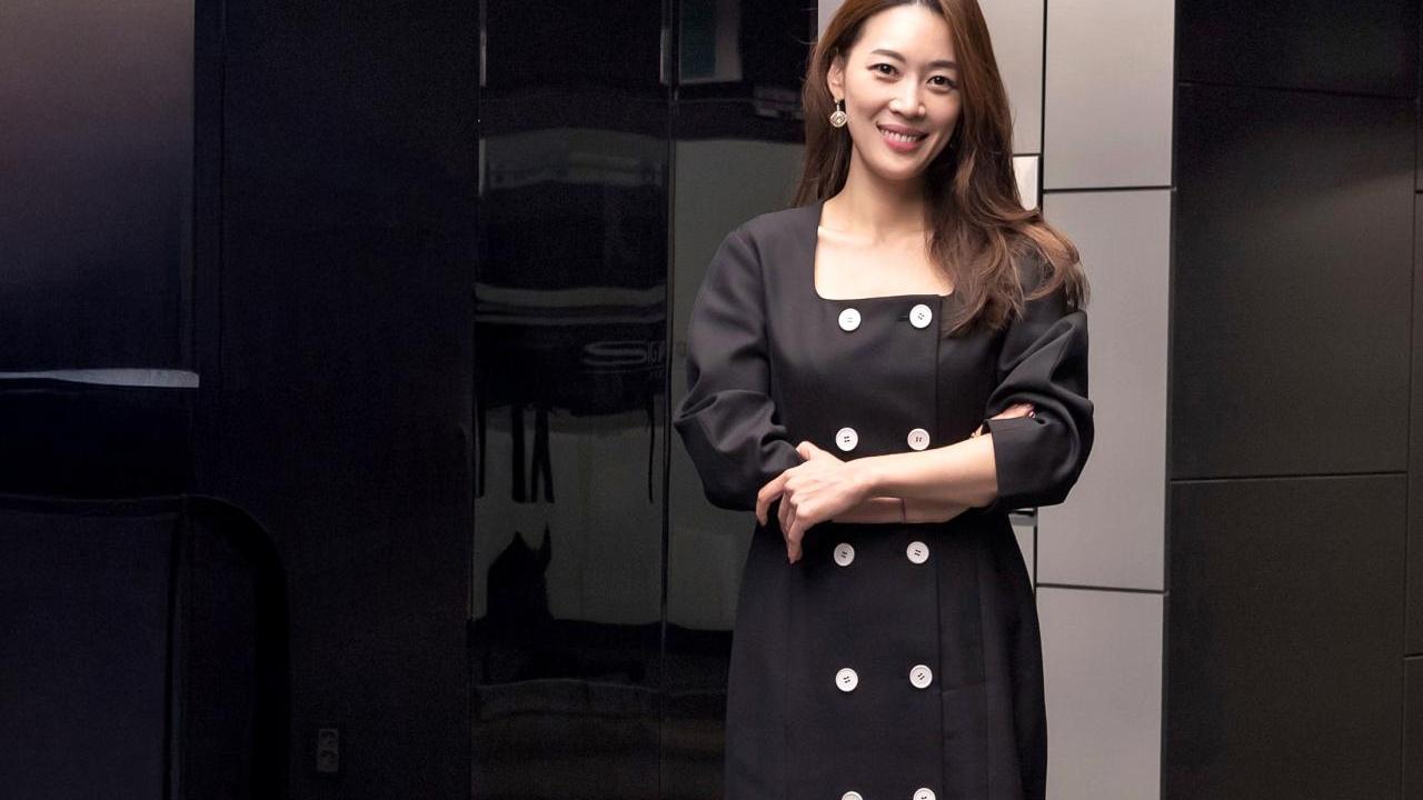 person standing and smiling