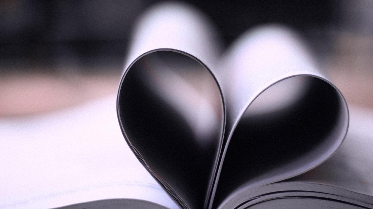 Image of book pages folded into a heart