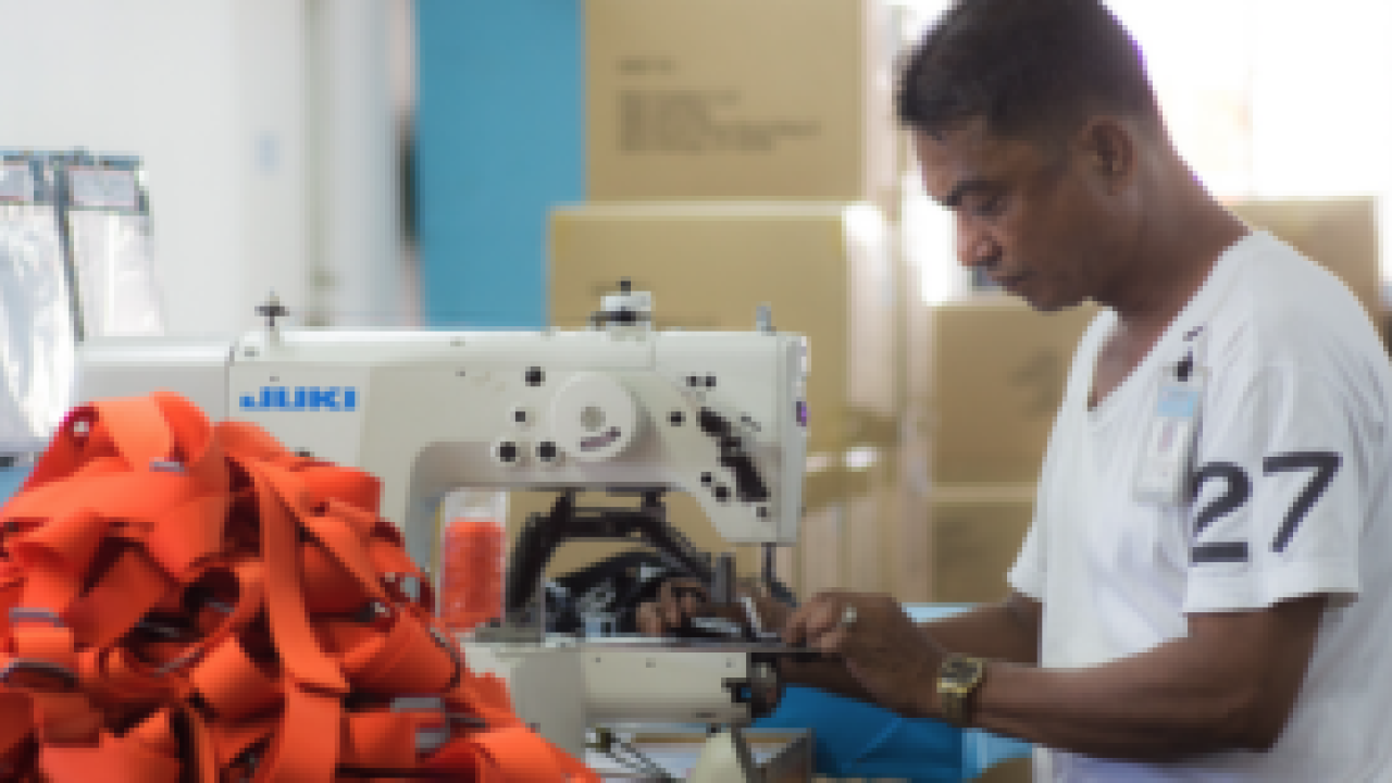 man sewing