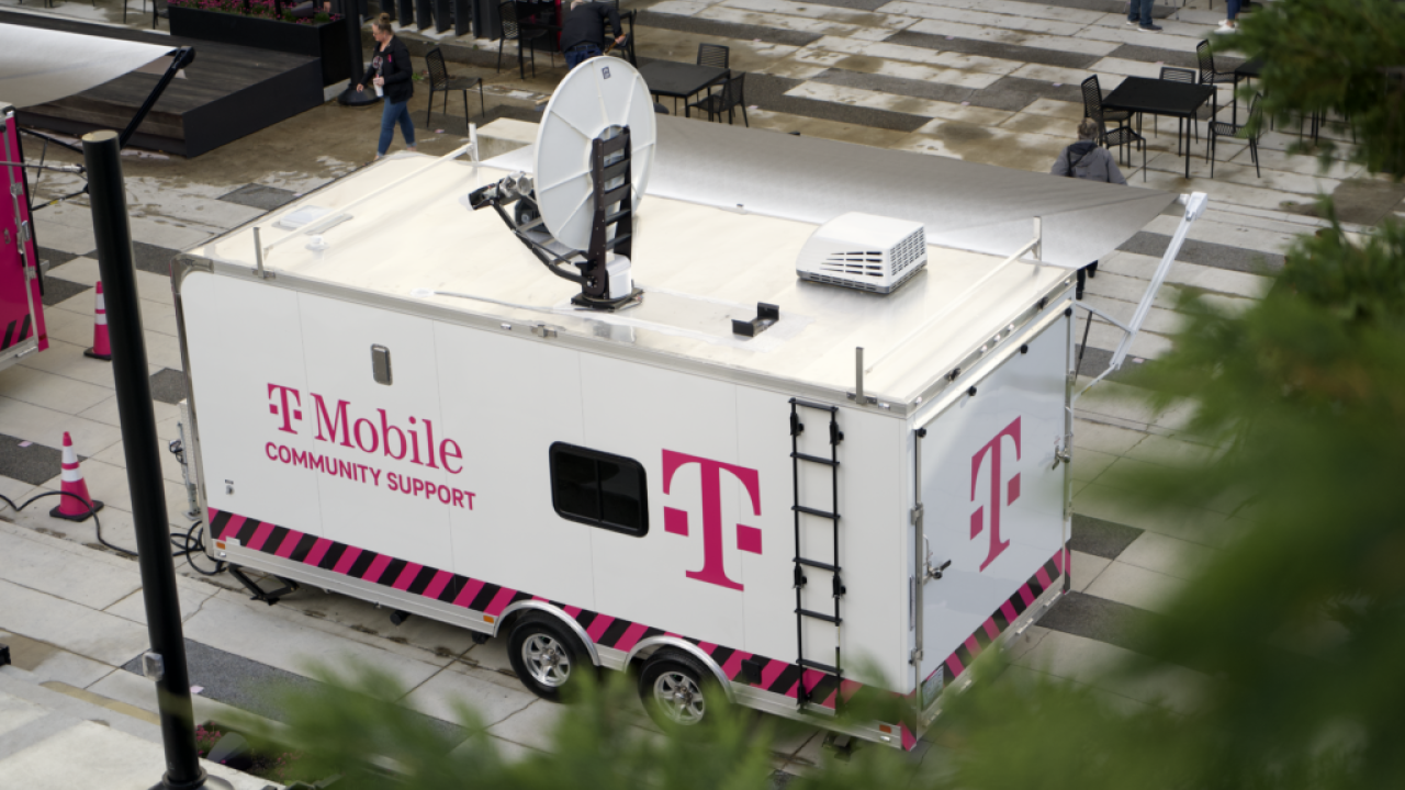trailer with satellite dish and tmobile logo