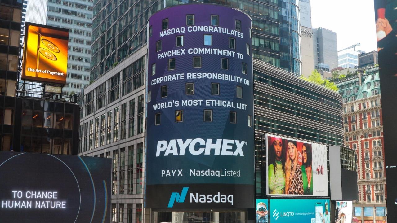 Nasdaq sign in Times Square with "Nasdaq congratulates Paychex commitment to corporate responsibility on world's most ethical list"