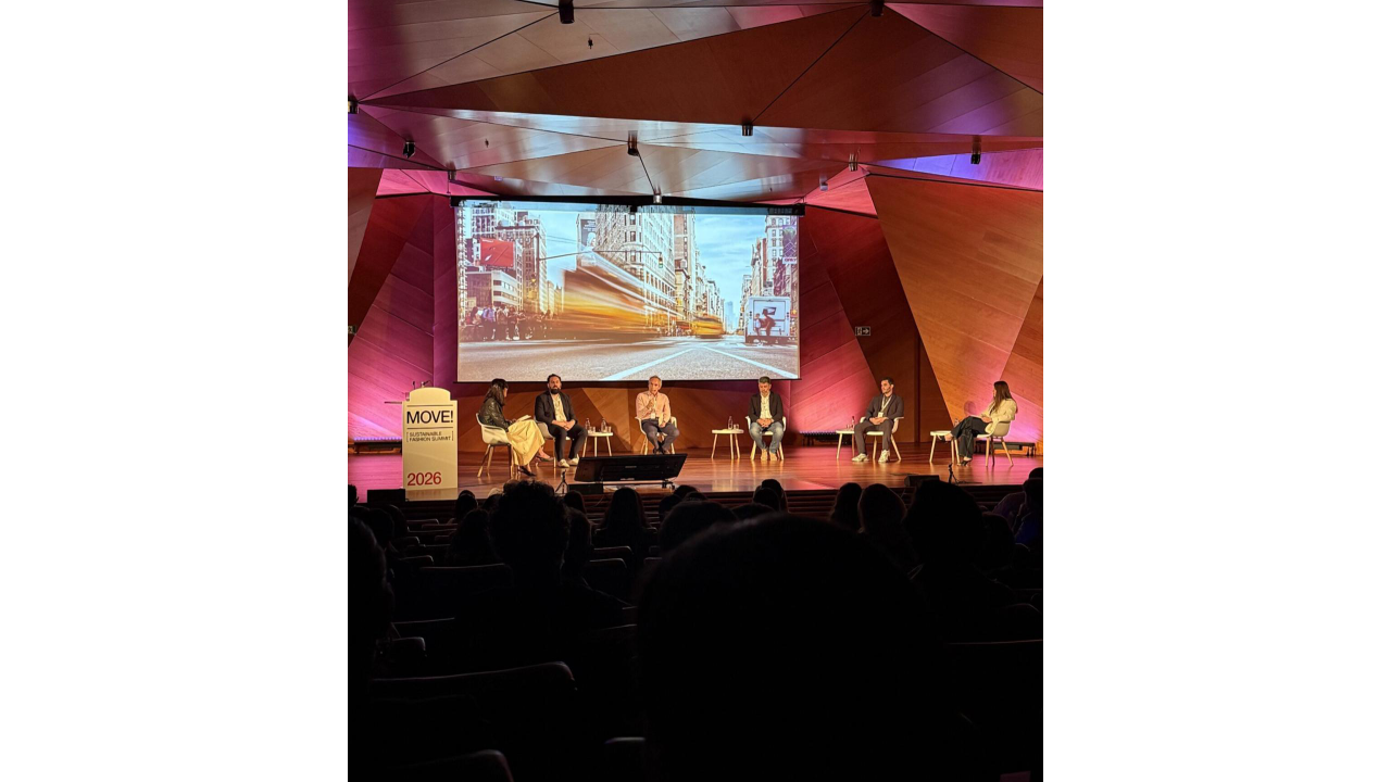 Speakers on stage at sustainability summit