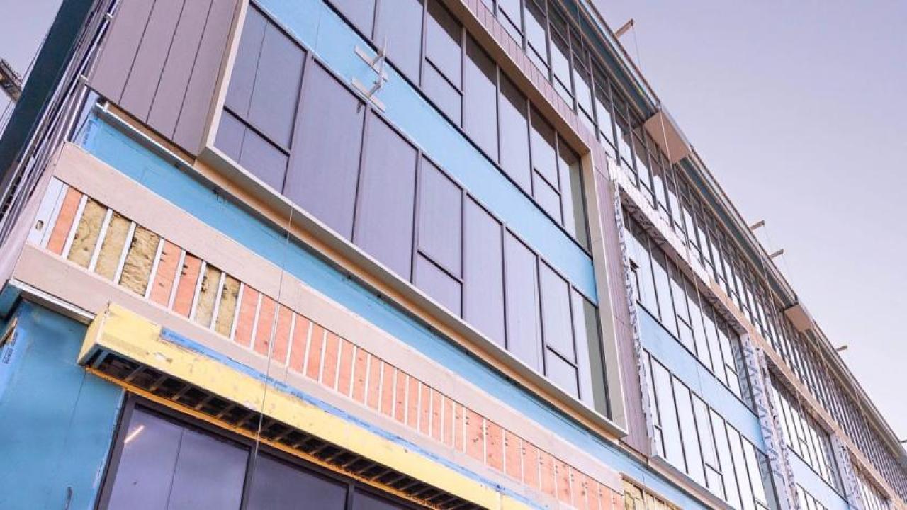 A multi-story building under construction.