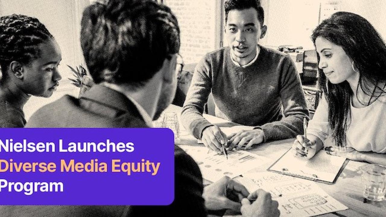 Nielsen Launches Diverse Media Equity Program: Two men and two women are seated at a table. All are of diverse ethnicities. 