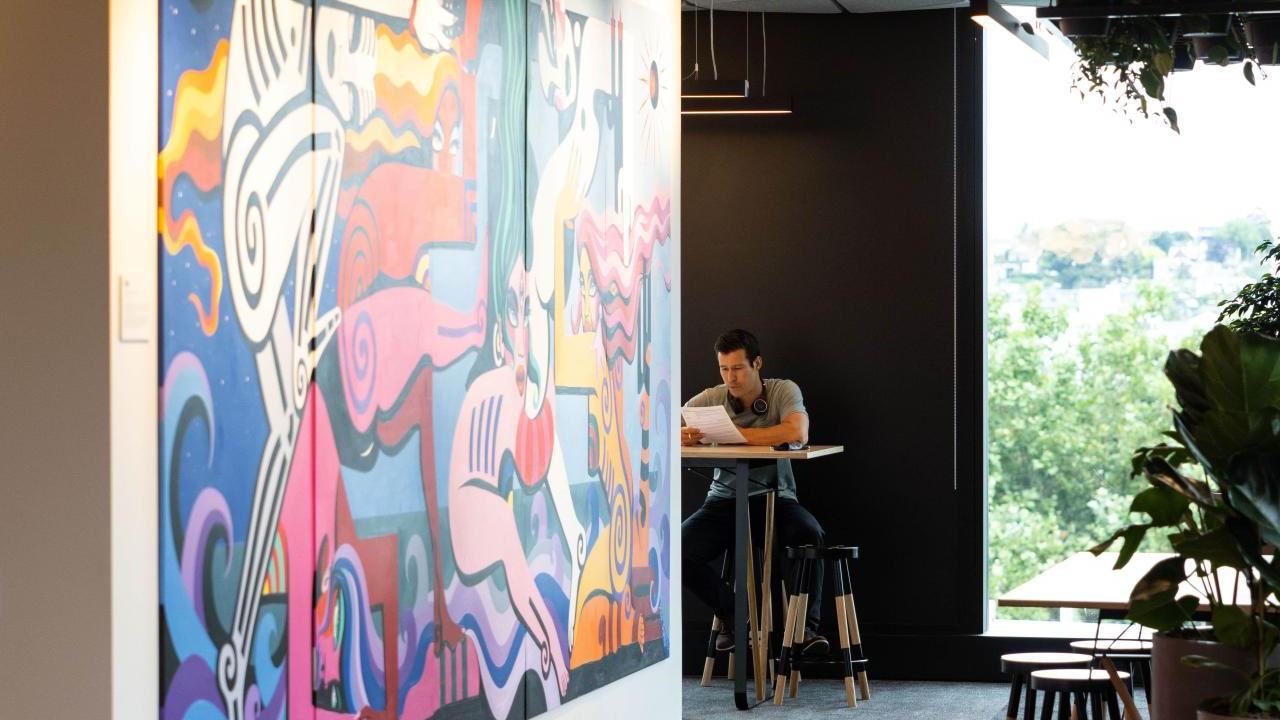 office space with a large painting