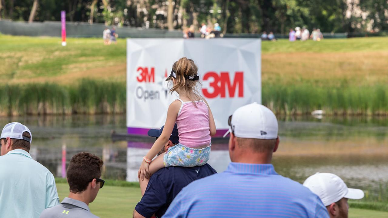 Spectators at a golf tournament