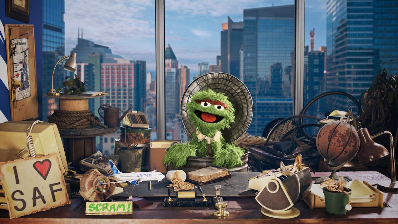Oscar sitting at his desk